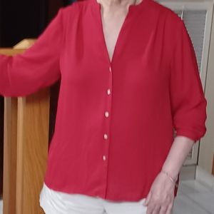 A New Day red blouse